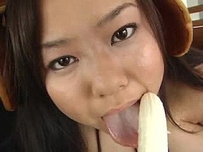 Big tits asian sucking a banana