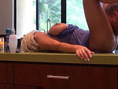 Housewife in a sexy dress boned in her house