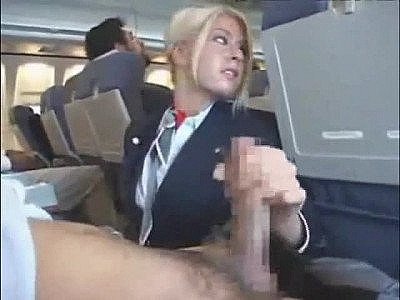 Stewardess sucking cock on a plane