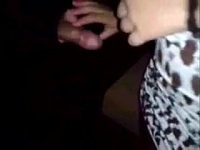 Girlfriend jerks off strangers in the gloryhole booth