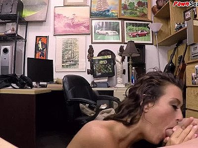 Tattooed amateur babe rides cock in office of the pawn shop